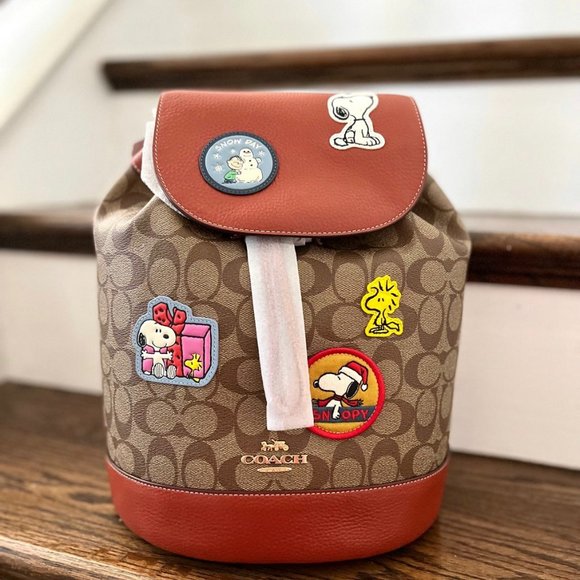 Coach X Peanuts Dempsey Drawstring Backpack In Signature Canvas With Patches - Picture 1 of 8